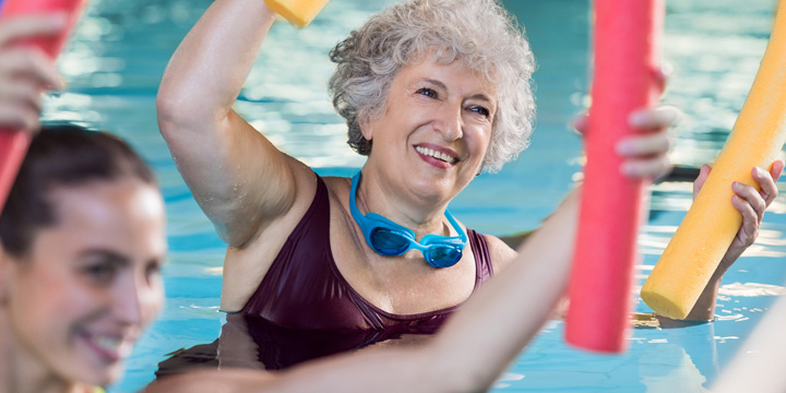 Senior woman doing aqua aerobic
