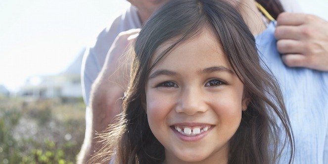 Smiling face of young girl type 1 diabetes