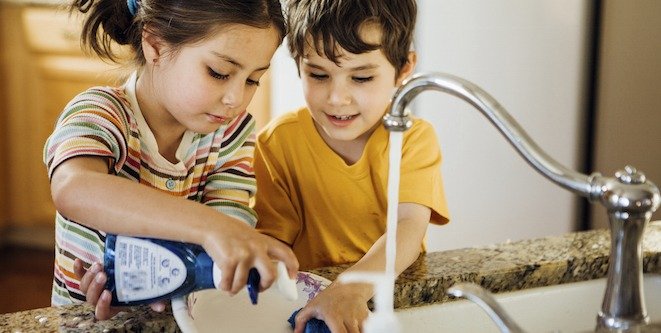 Home fun for kids Toddlers having fun washing dishes