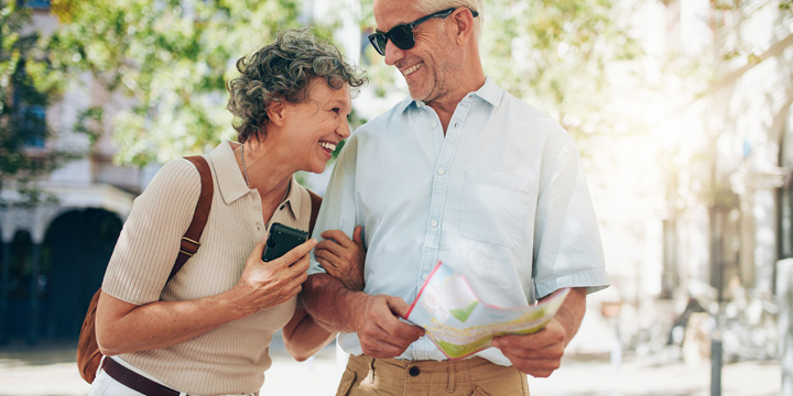 Retired couple walking around the town