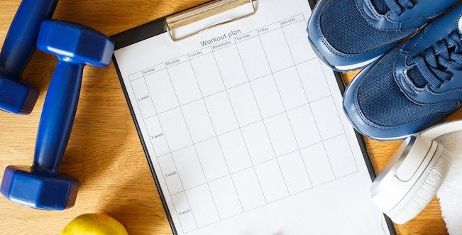 Personal workout plan with sneakers and dumbbells Exercise plan for diabetes - daily, weekly, monthly