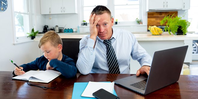 Coronavirus Outbreak schools and offices closing. Stressed parent trying to cope with remote work and homeschooling. COVID-19 pandemic forces shutdowns, quarantine, online learning and work from home. stress