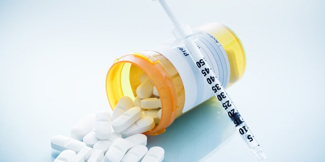 Syringe and Pills