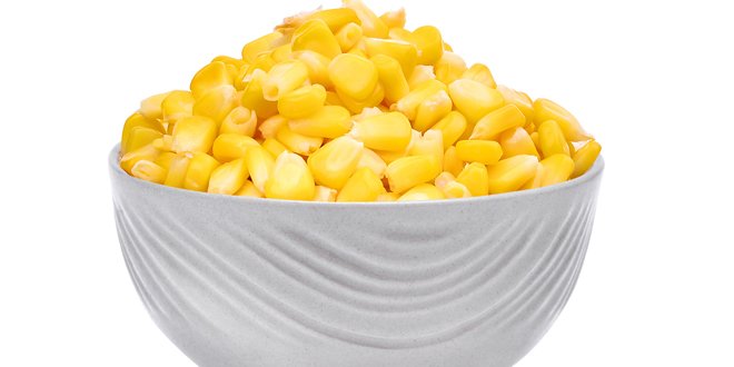 sweet corn in the white bowl isolated on white background corn in a bowl