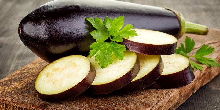 sliced eggplant on cutting board egg plant