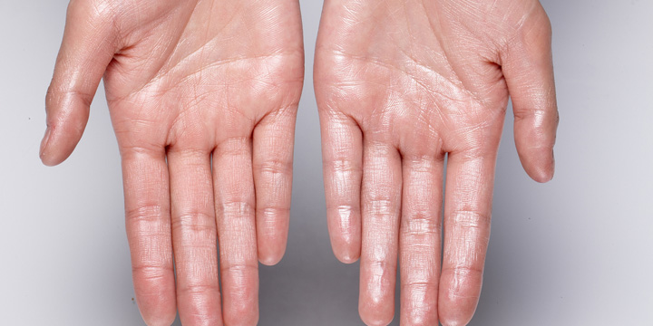 glossy hand. wet hands.