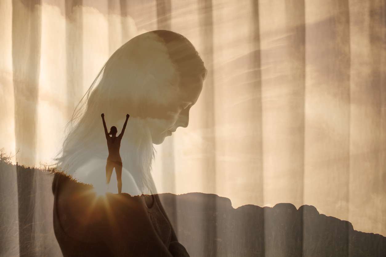 Sad woman finding hope. Overcoming self doubt finding strength and inner happiness. Sad woman