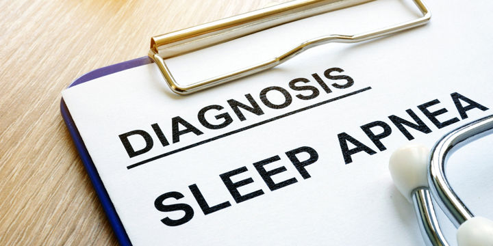 Sleep apnea diagnosis on a clipboard.
